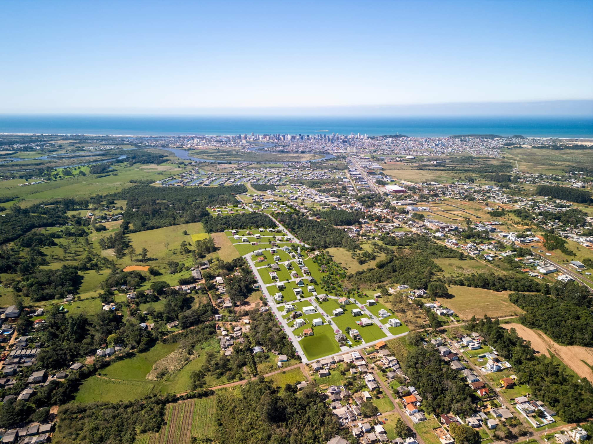 Vista aérea de Torres com o mar ao fundo e o loteamento Reserva Limoeiro, em montagem ilustrativa sobre foto aérea