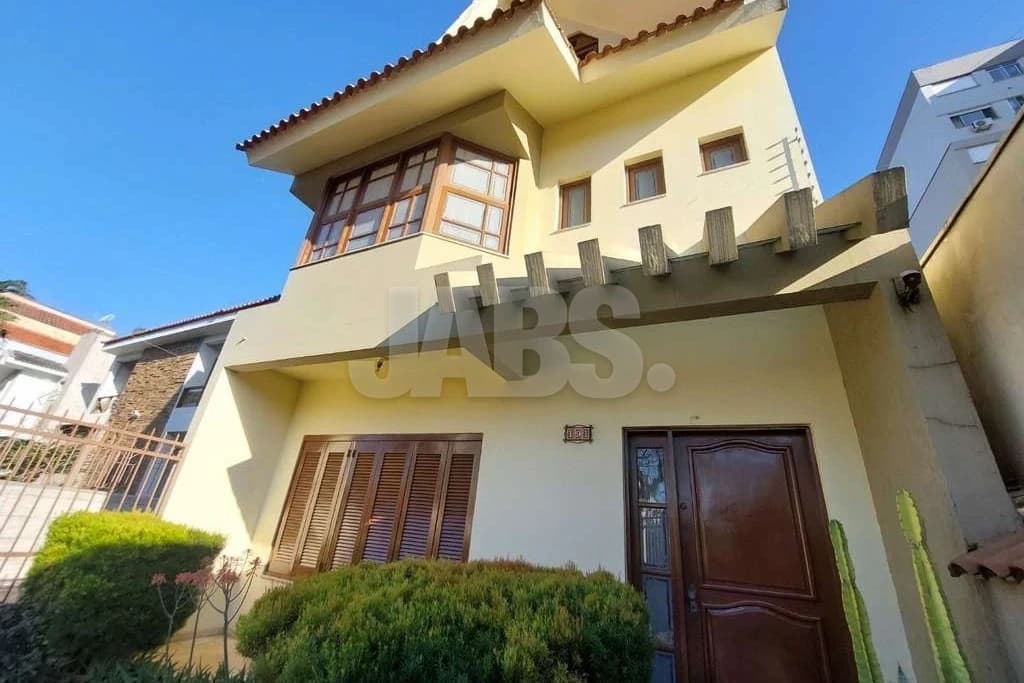 Sobrado de 4 quartos com suíte, closet, hidromassagem e lareira no Camaquã, foto 1