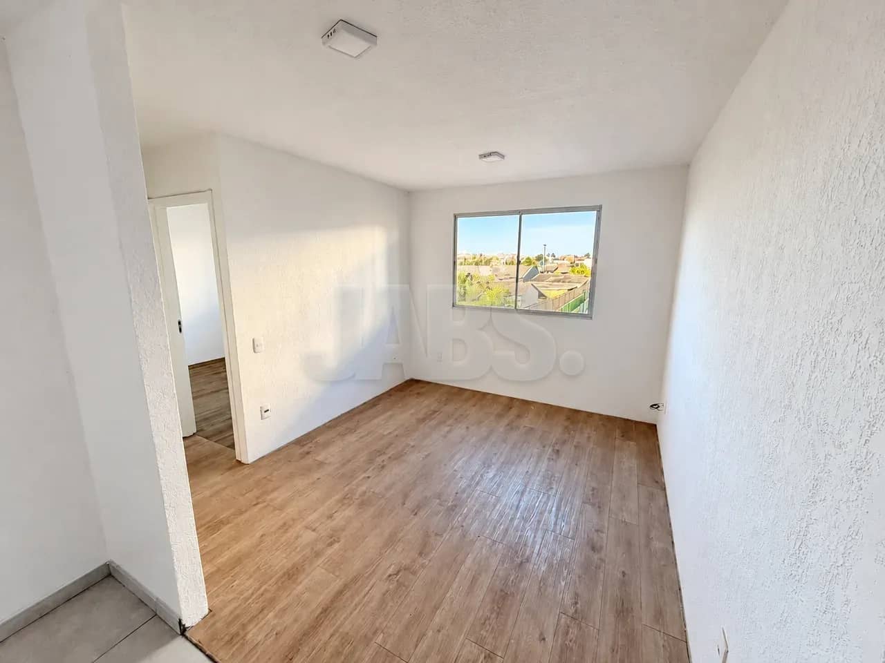 Sala e passagem para os quartos