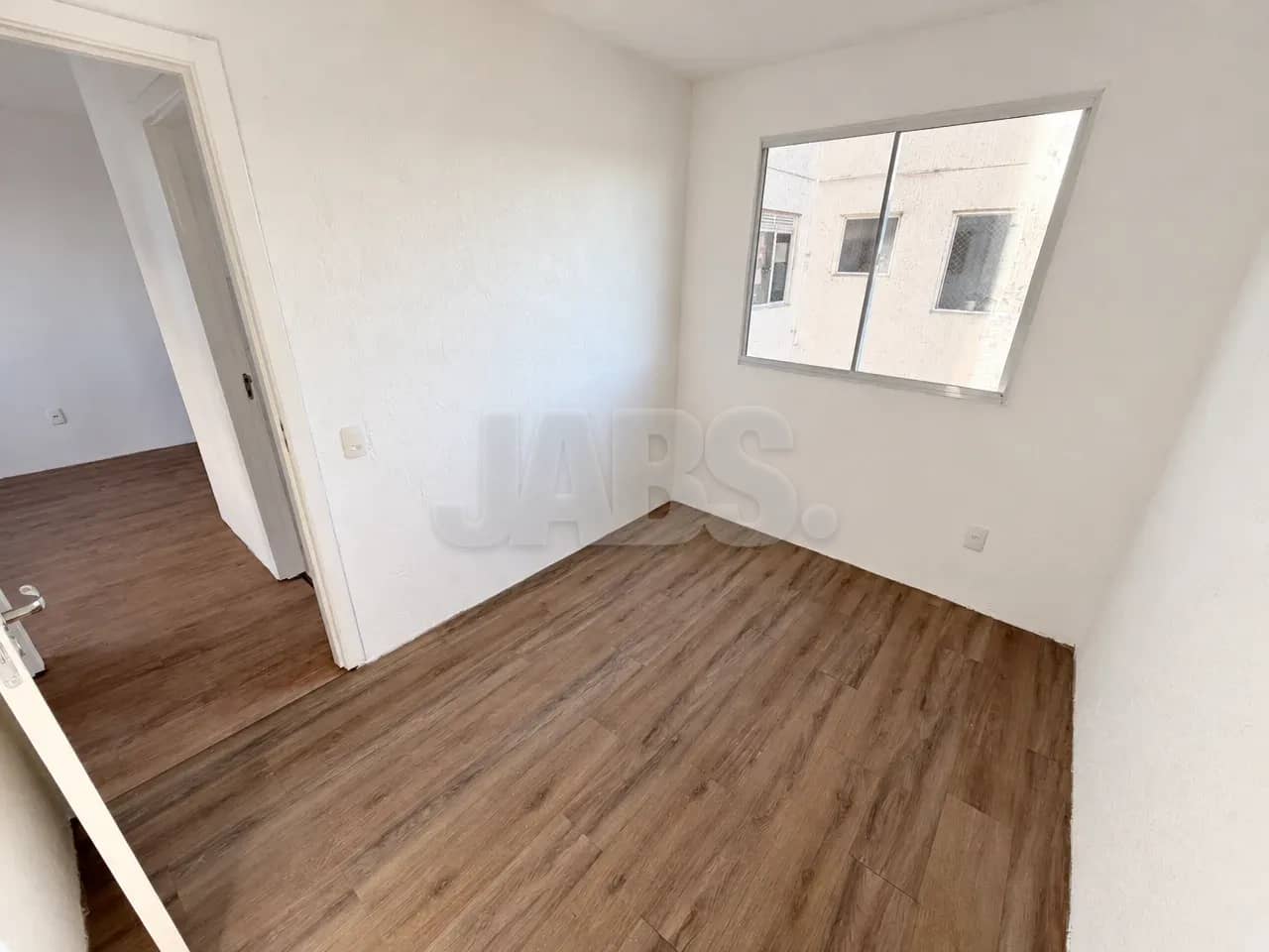 Quarto com vista para o condomínio