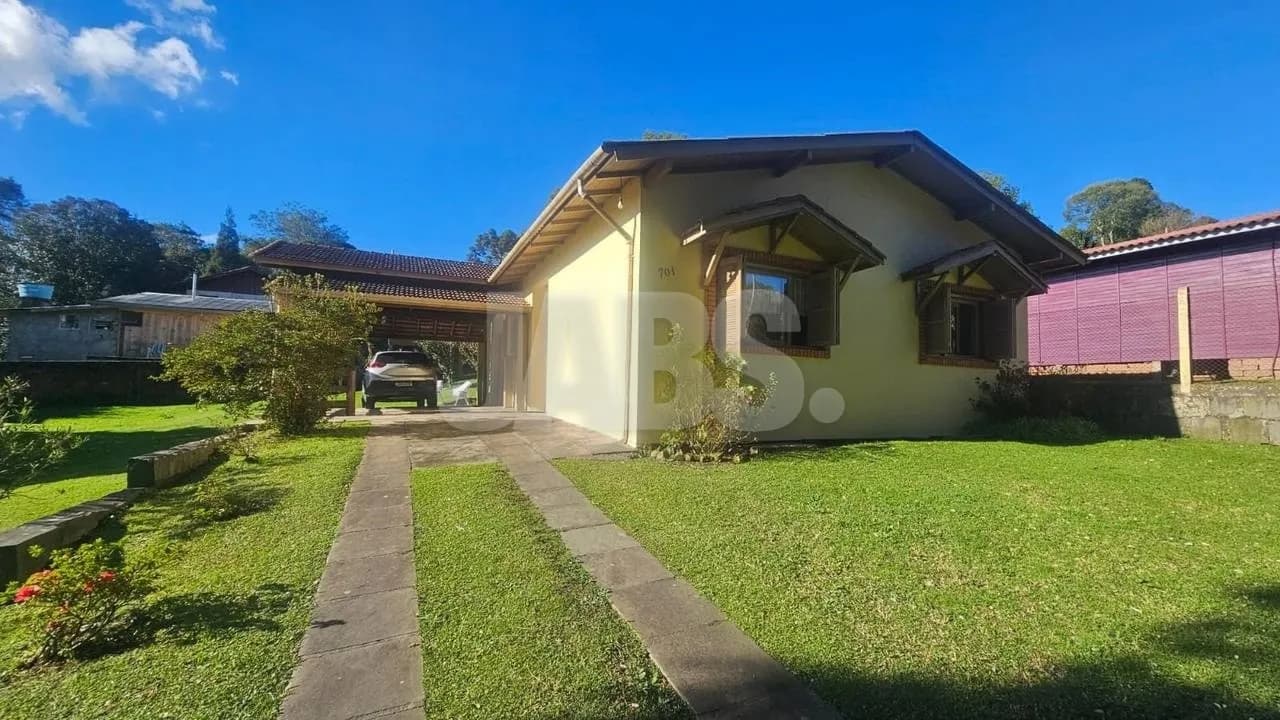 Casa de 2 dormitórios com terreno generoso na Vila Maggi, foto 1