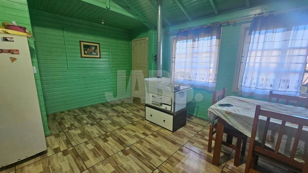 Terreno com 2 casas alugadas na Vila do Cedro, foto 2