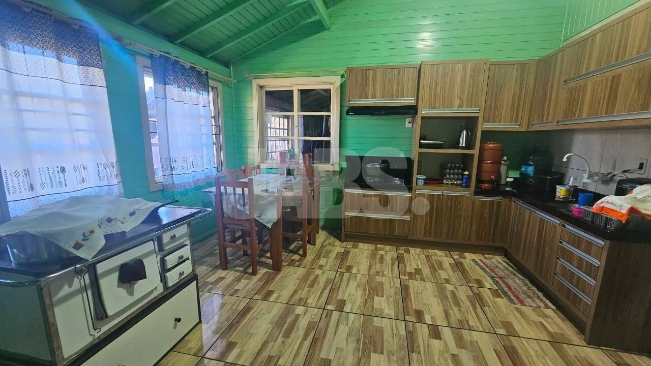 Terreno com 2 casas alugadas na Vila do Cedro, foto 5