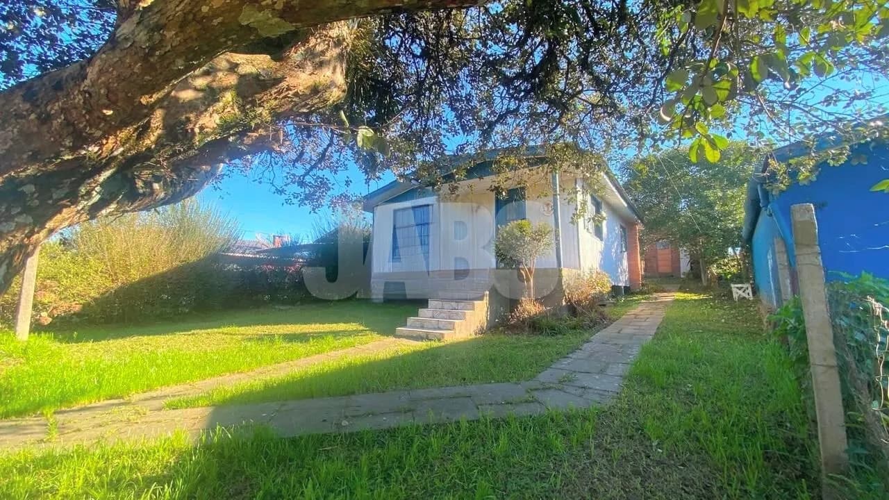 Terreno de 557 m² com 2 casas alugadas e acesso por 2 ruas, foto 1