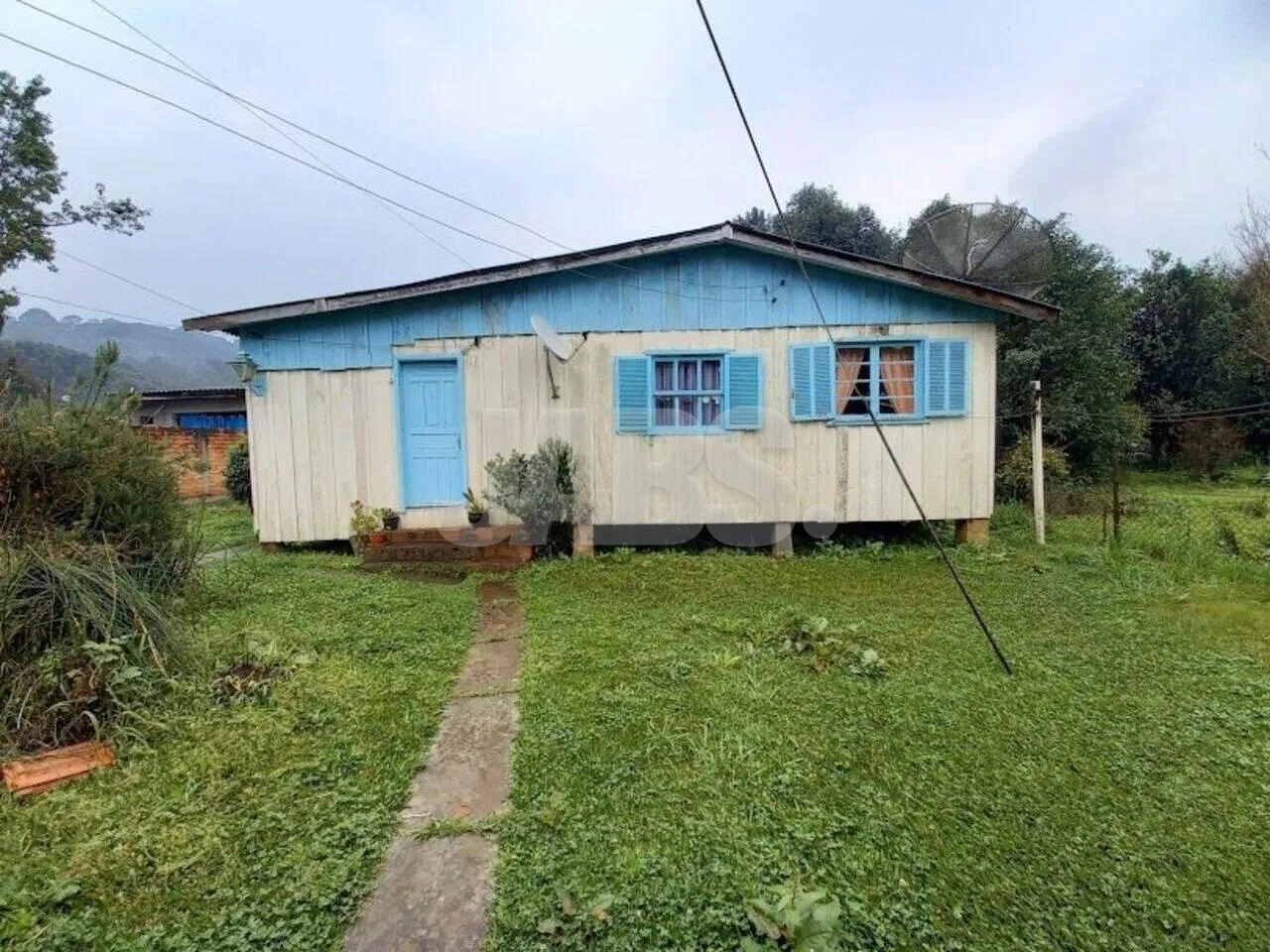 Terreno de 682 m² com 2 casas de madeira no Celulosi, foto 6