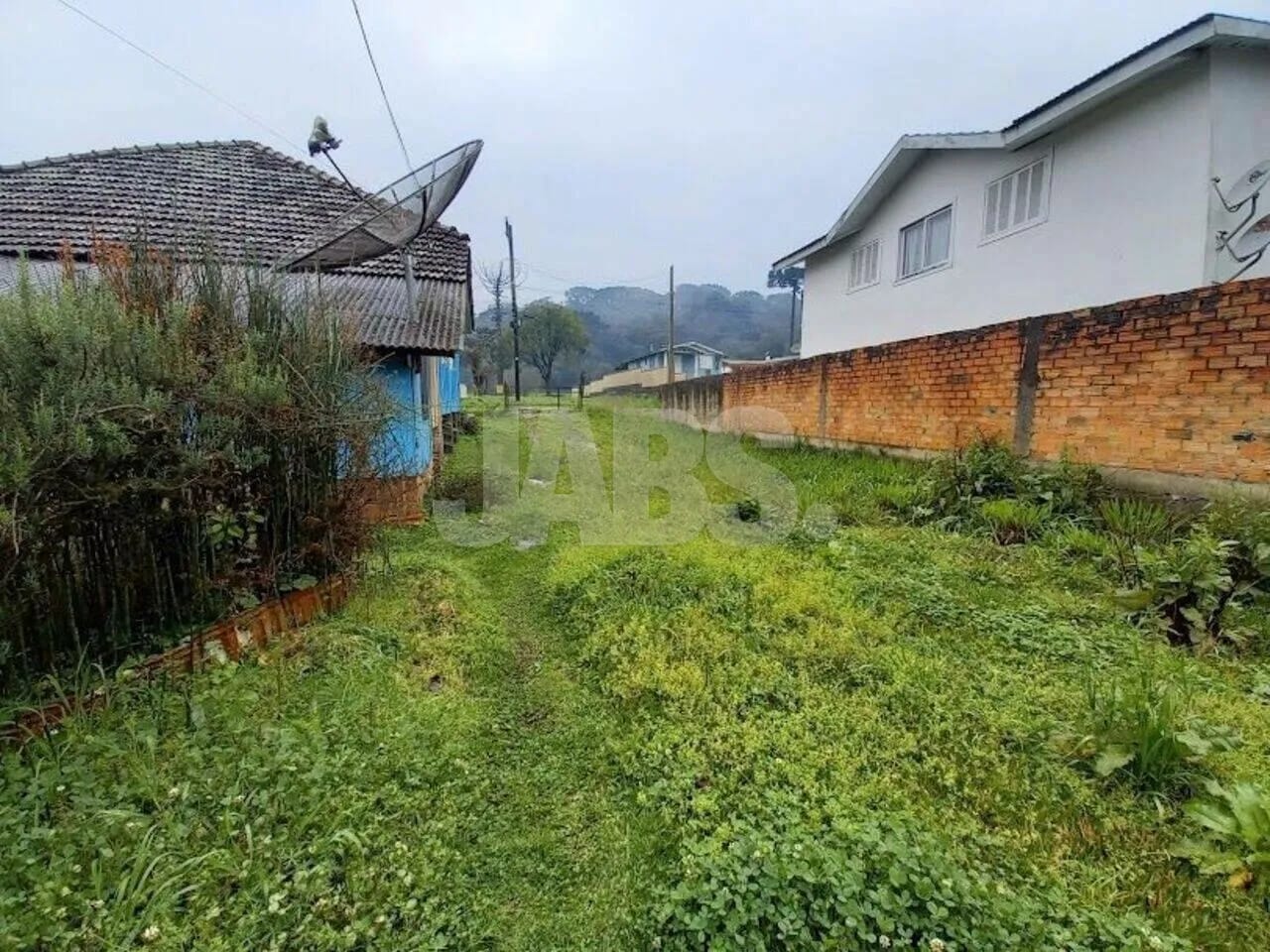 Terreno de 682 m² com 2 casas de madeira no Celulosi, foto 7