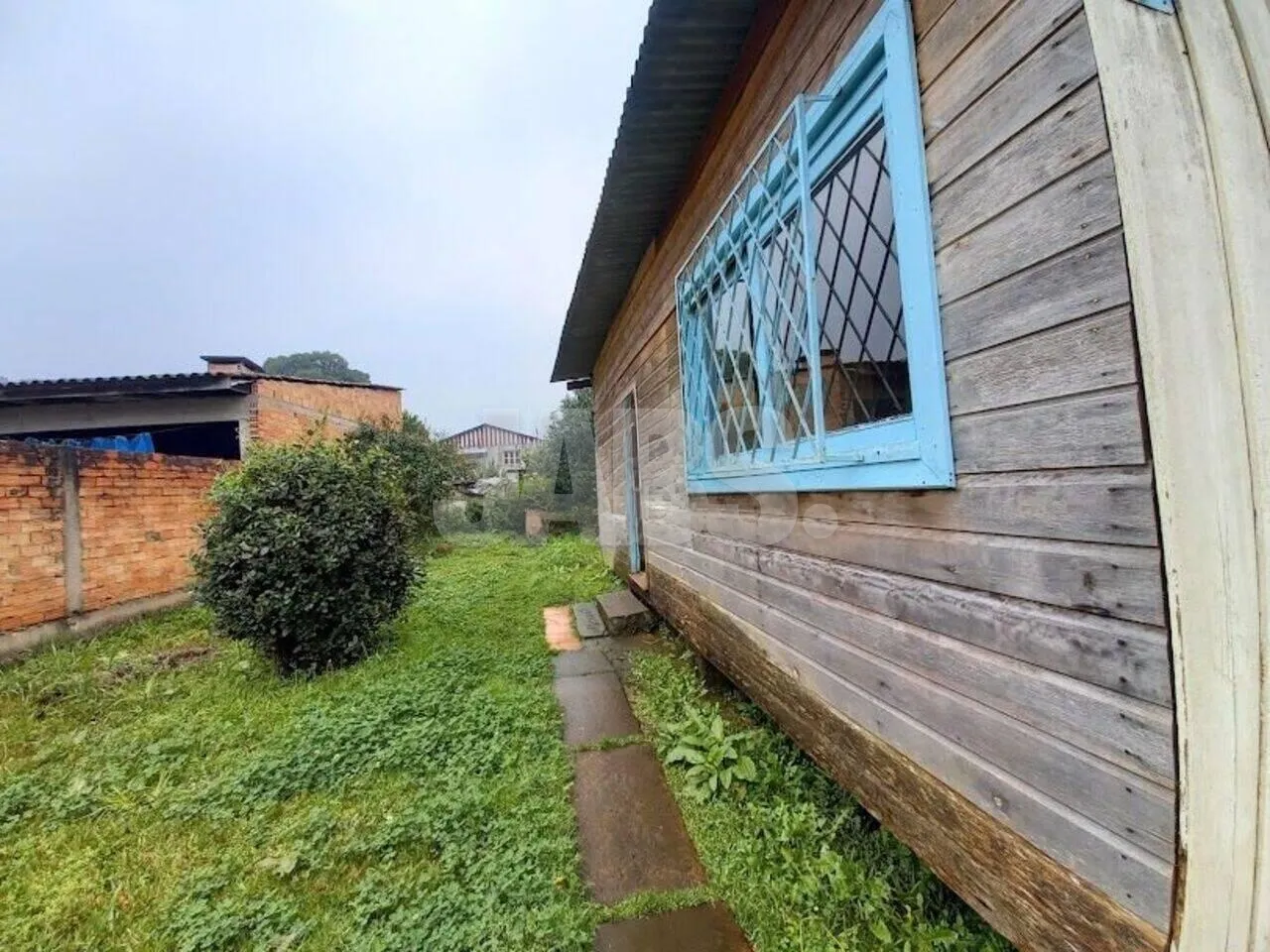 Terreno de 682 m² com 2 casas de madeira no Celulosi, foto 8