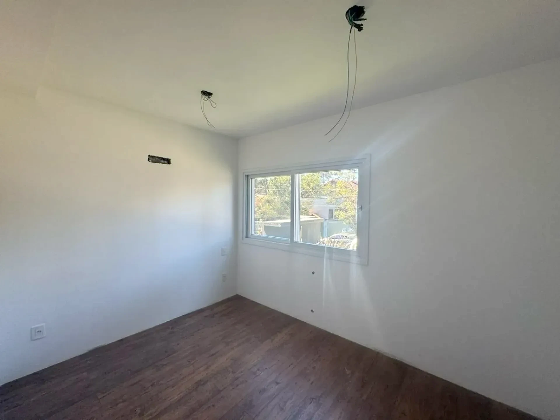 Quarto com vista para a rua
