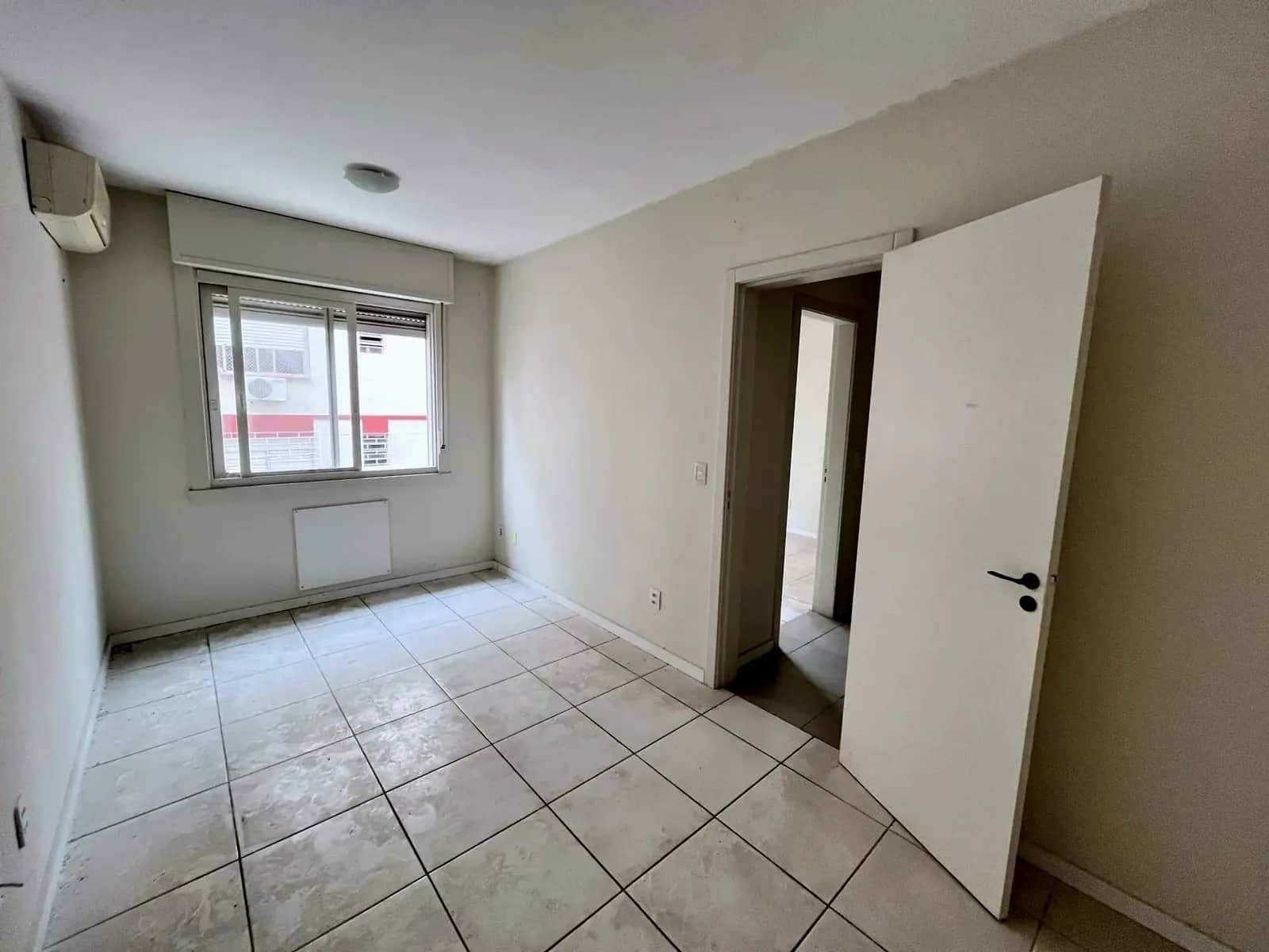 Dormitório com ar-condicionado