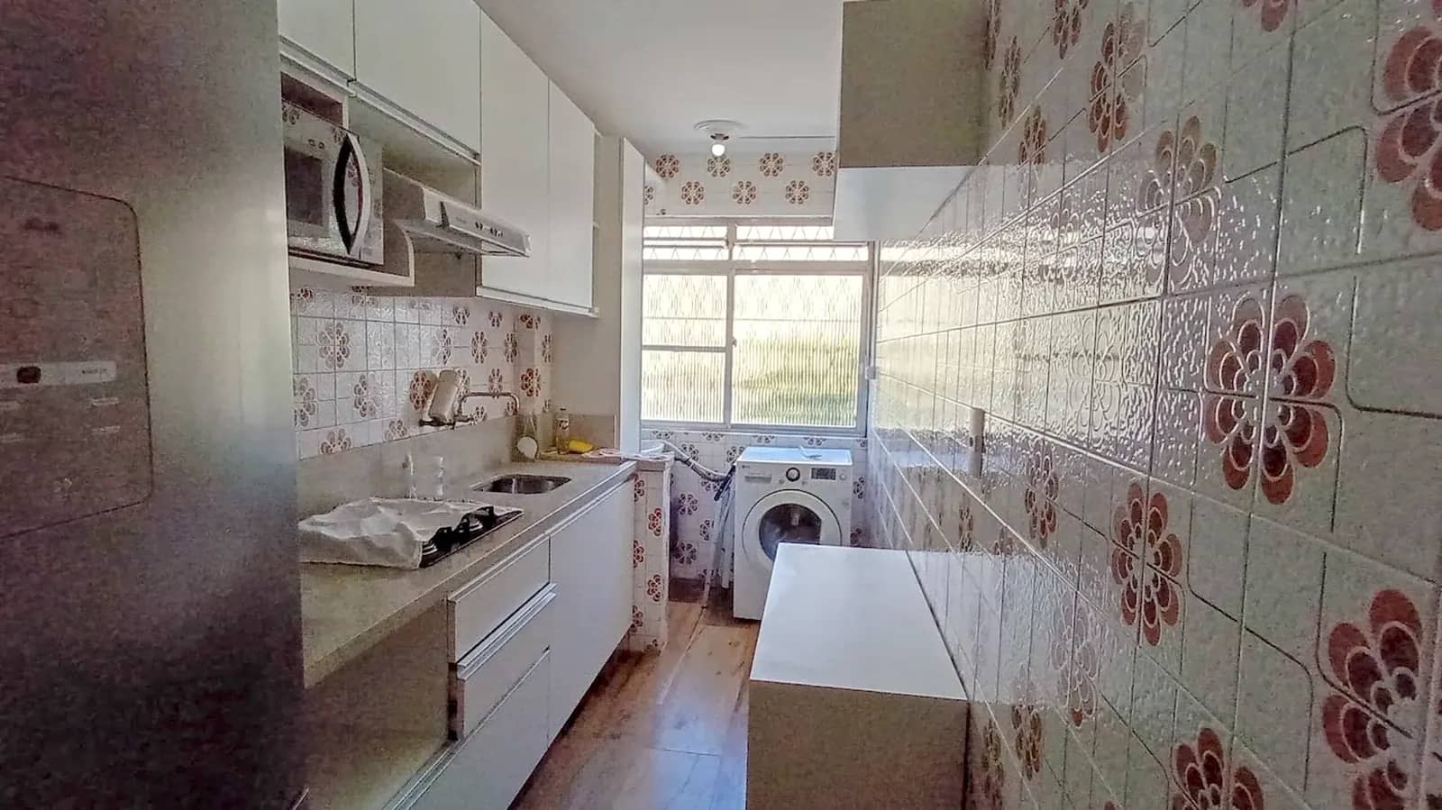 Cozinha integrada à área de serviço