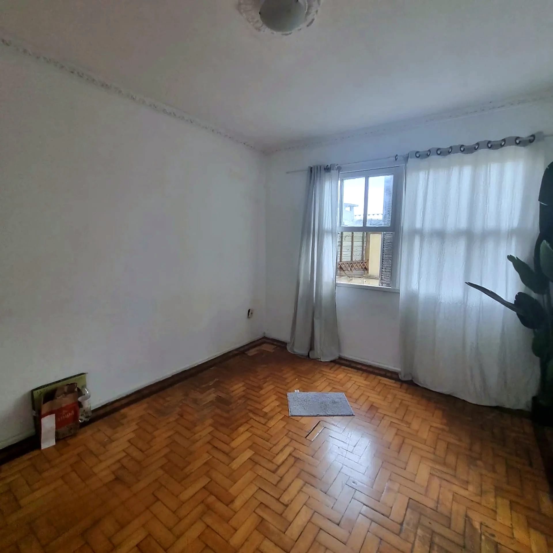 Dormitório com cortina