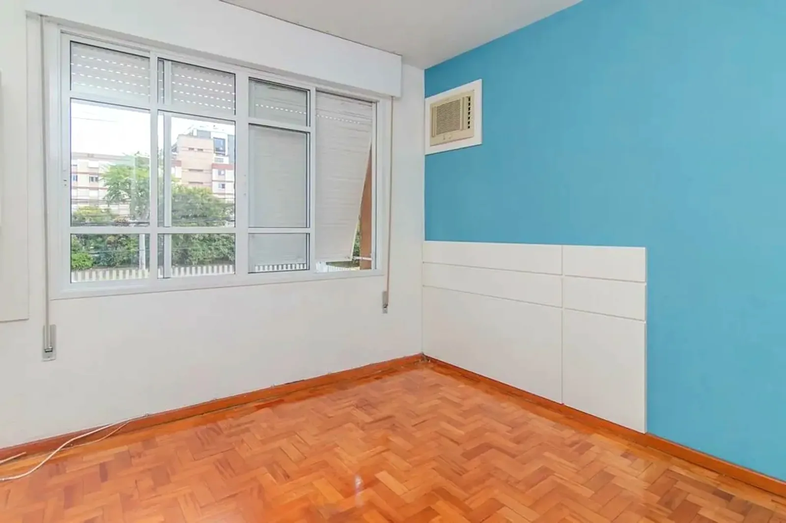 Dormitório com ar-condicionado