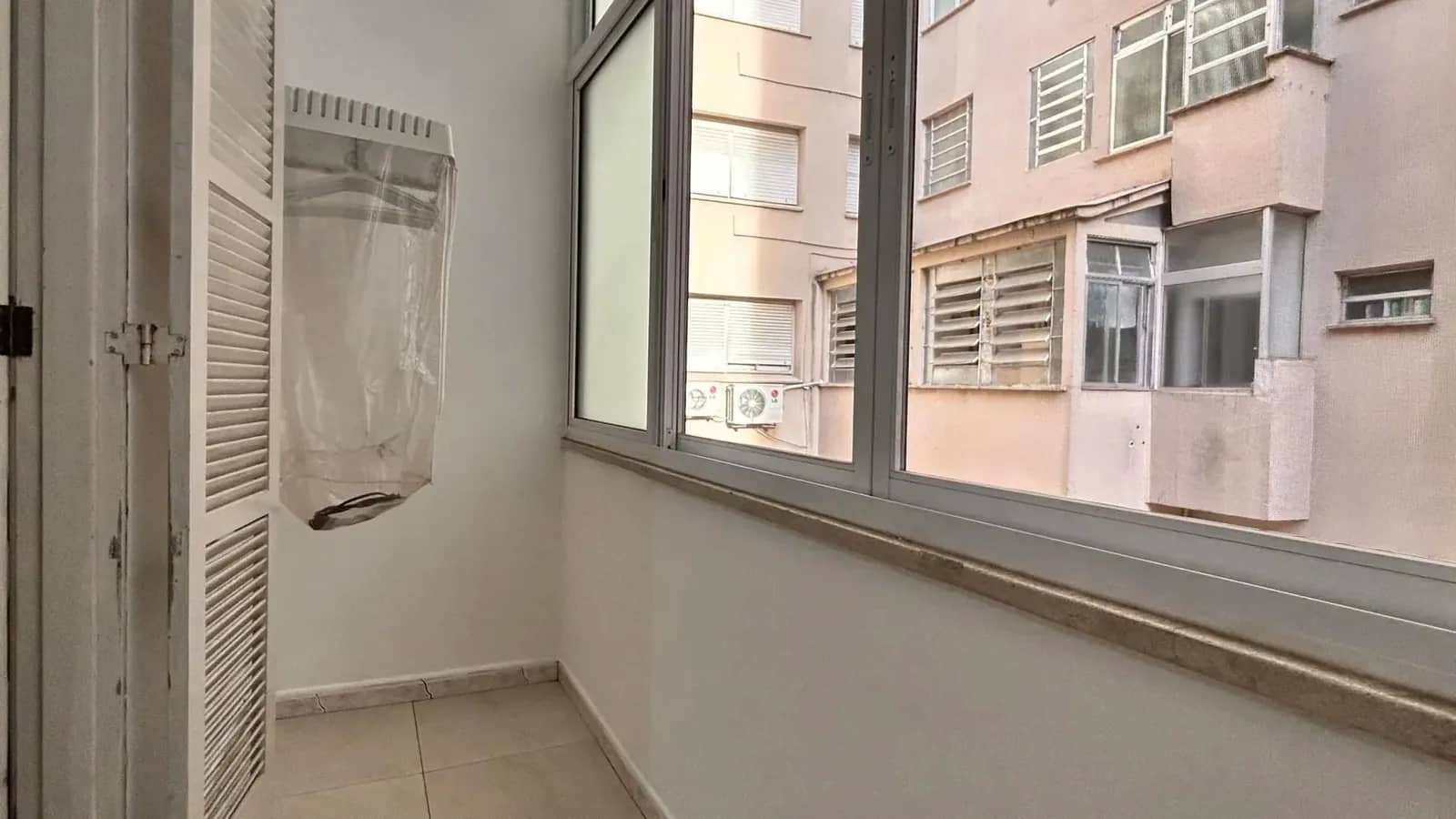 Área envidraçada junto ao quarto