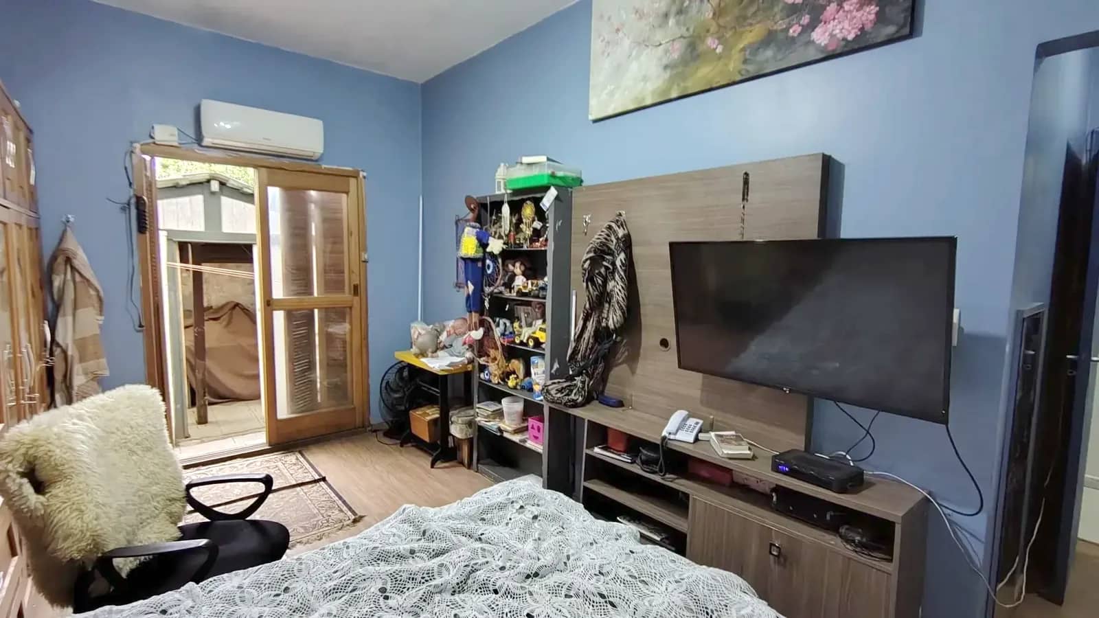 Suíte com espaço para TV