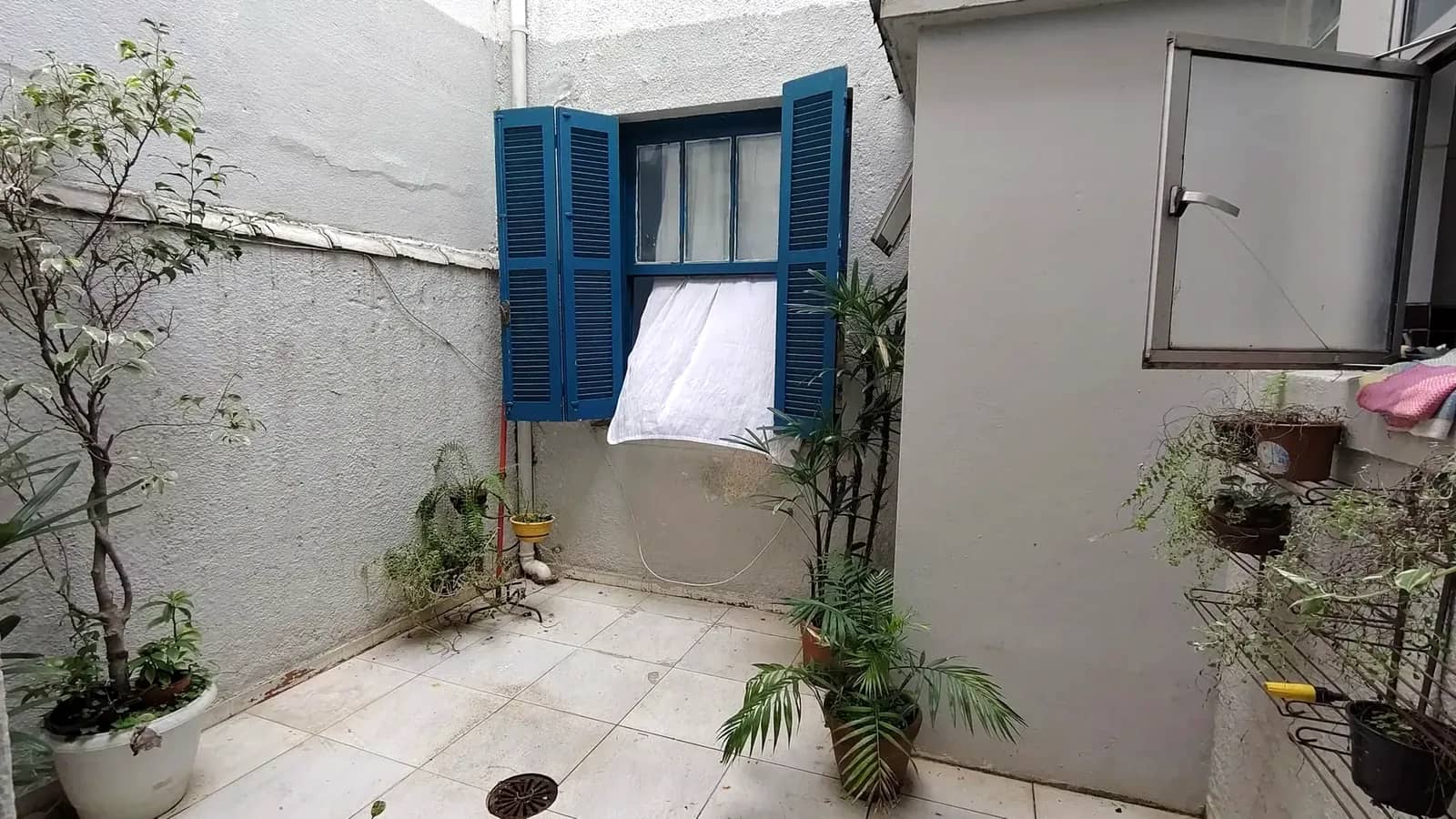 Pátio privativo com jardim
