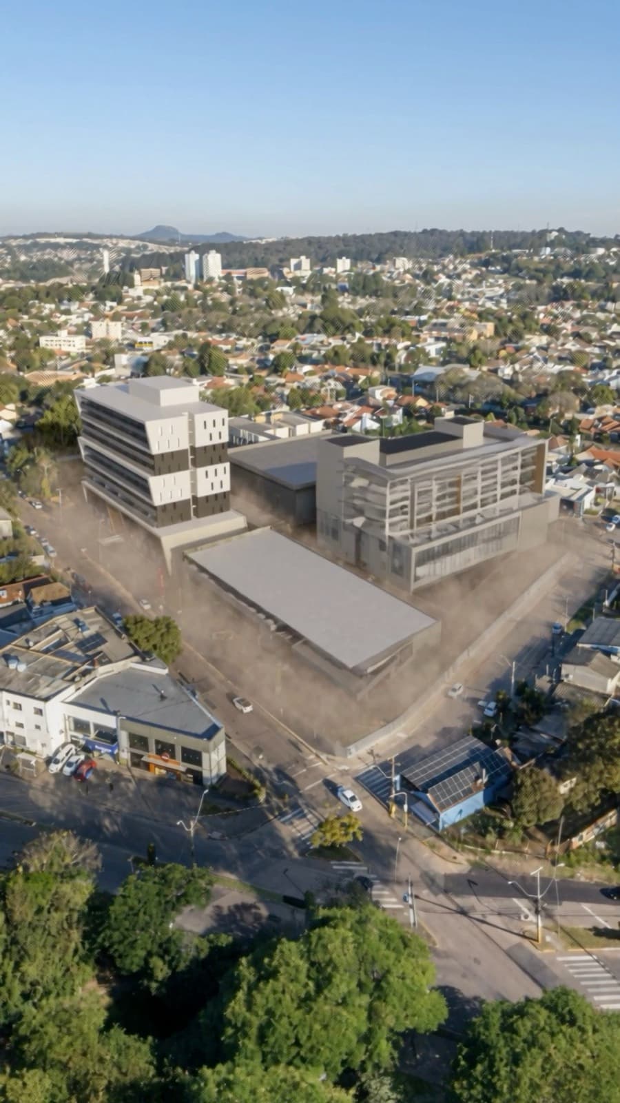 Vista aérea da implantação do Doctor Center, ocupando um quarteirão inteiro junto às vias principais.