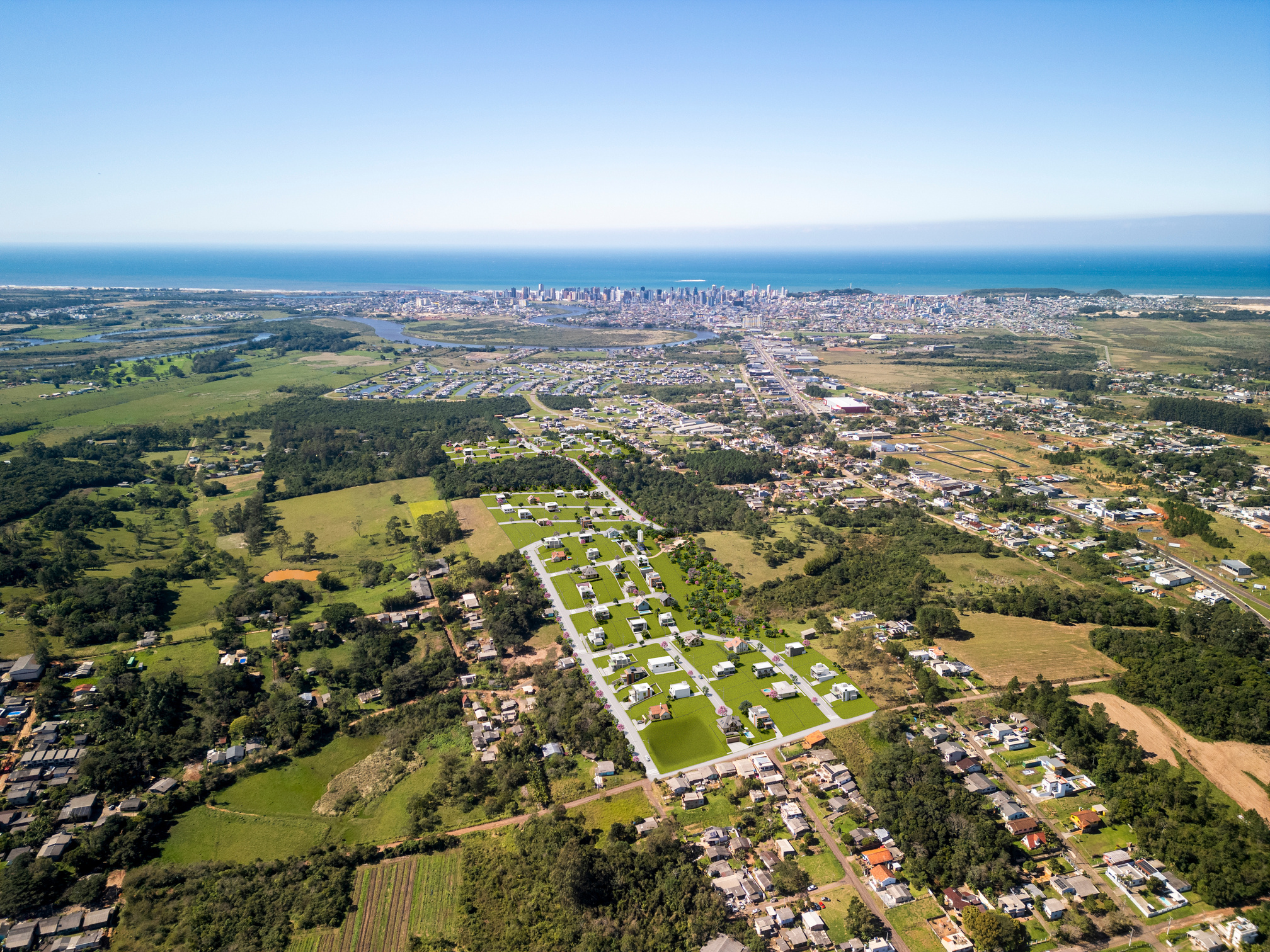 Vista aérea de Torres com o mar ao fundo e o loteamento Reserva Limoeiro, em montagem ilustrativa sobre foto aérea